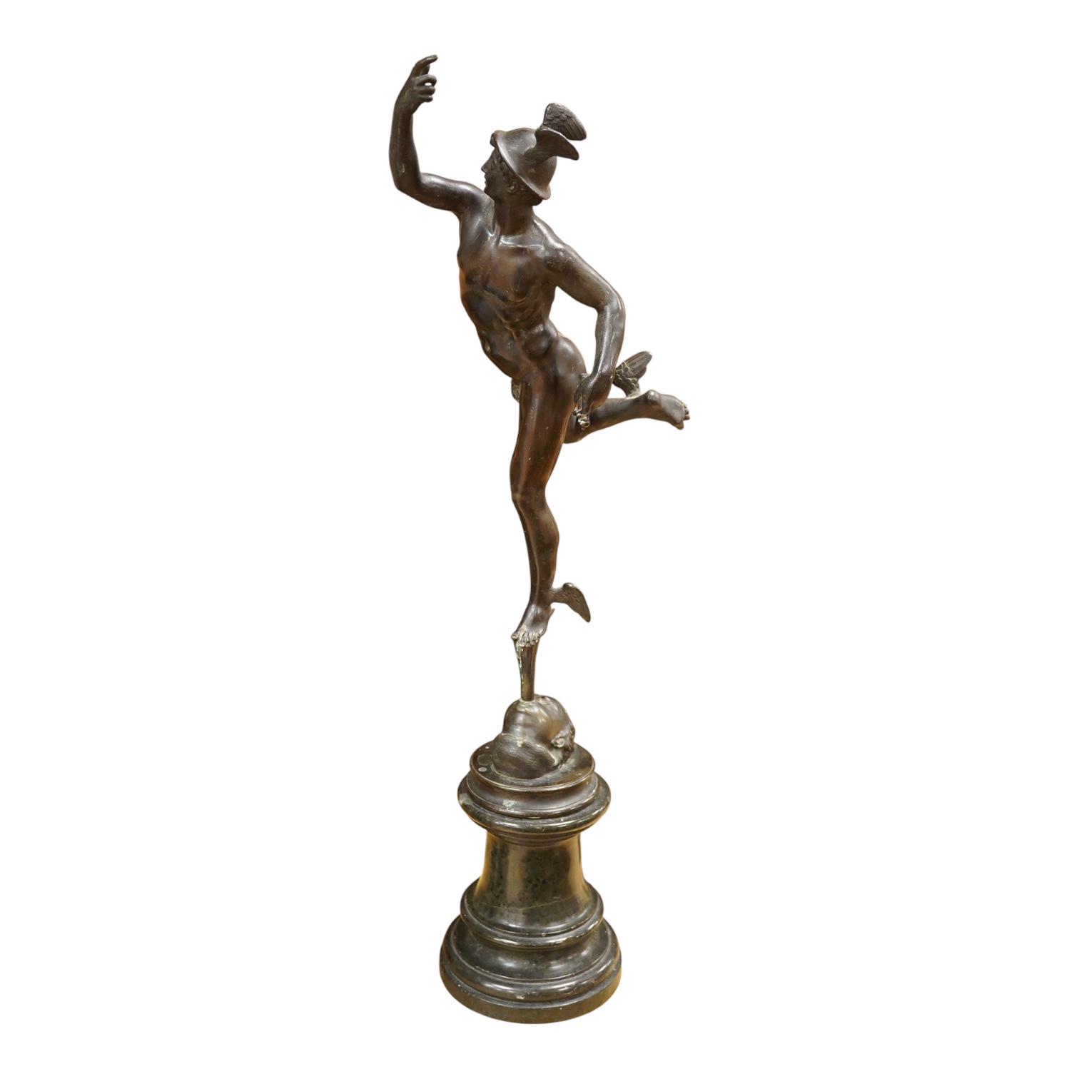 After Giambologna (Flemish, 1529-1608), a 20th Century bronze of Mercury, raised on green serpentine base, 61cm high
